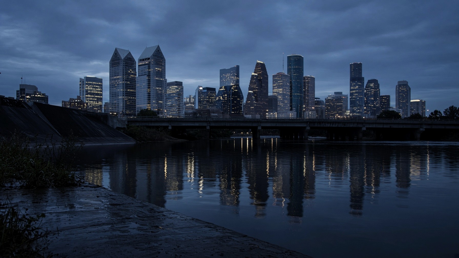 Buffalo Bayou at night with the Houston skyline