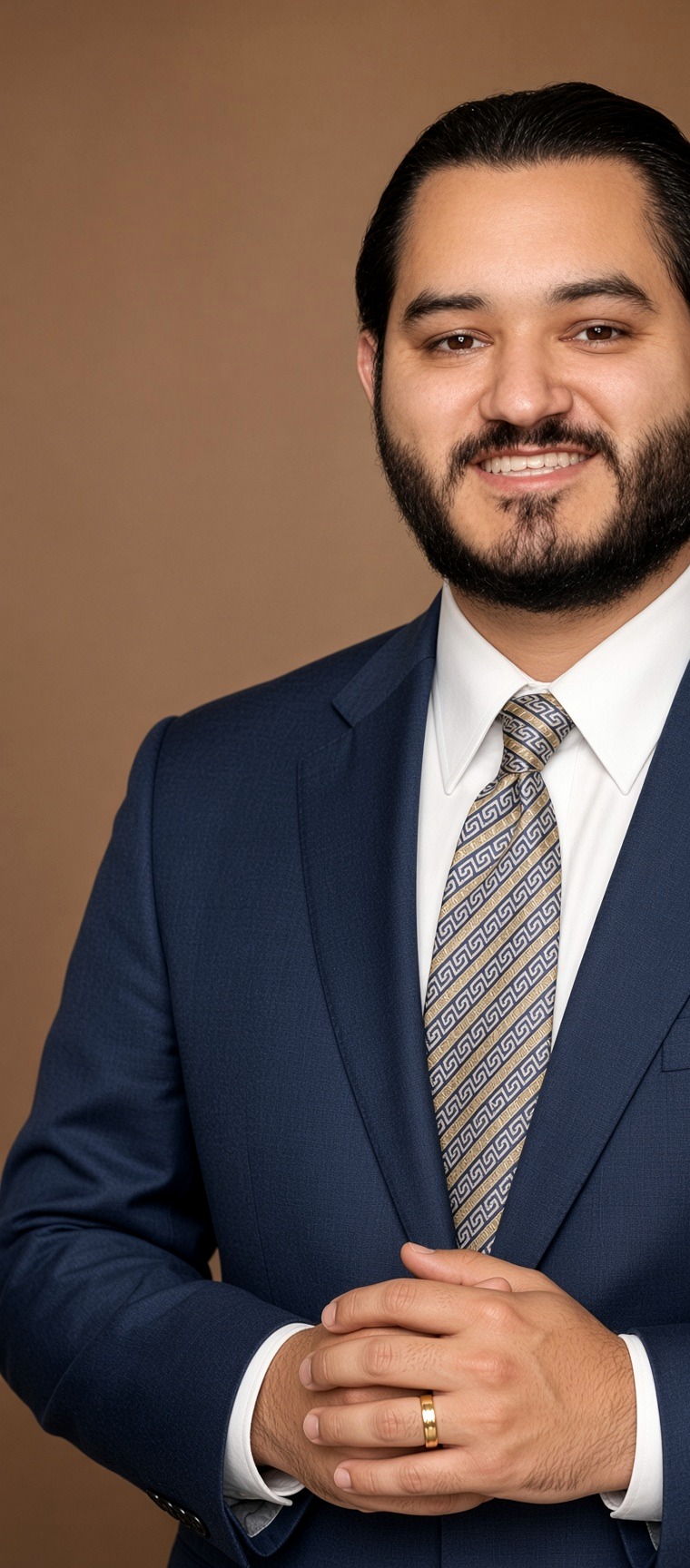 Jacob Vela in a navy suit
